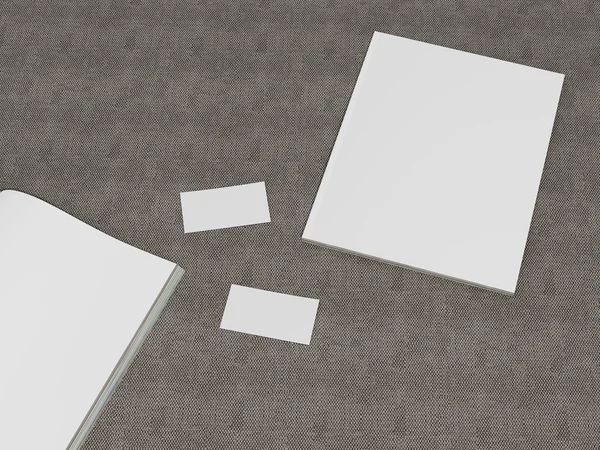 Cubierta de revista abierta con maqueta de página blanca en blanco sobre fondo de tela — Foto de Stock