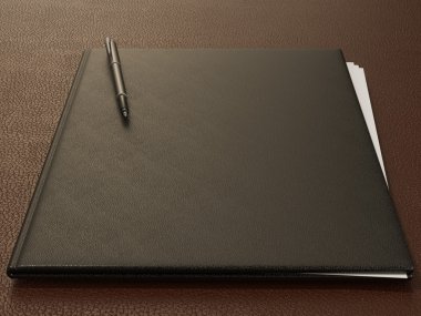 Klasör ve ofis malzemeleri üzerinde kahverengi deri