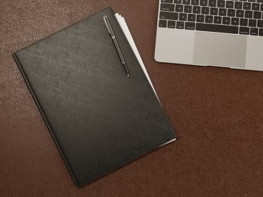 Klasör ve ofis malzemeleri üzerinde kahverengi deri
