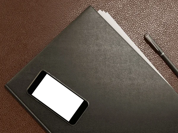 Folder and office supplies on brown leather — Stock Photo, Image