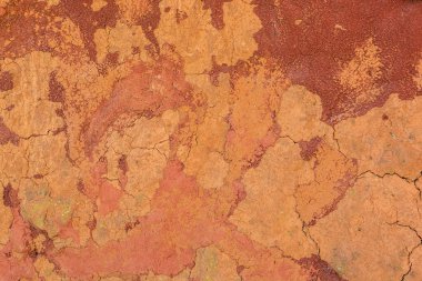 Kırmızı grunge duvar yüzeyi. Kırık Beton doku closeup backgr