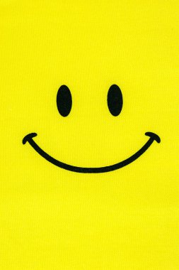 Gülen surat, kumaş dokusu üzerinde komik surat 