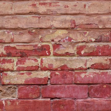 Kırmızı ve turuncu tuğla kaplama bir tuğla duvar, antika arka plan