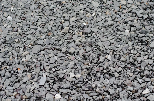 Textura de una pasarela gris de grava y piedras trituradas — Foto de Stock