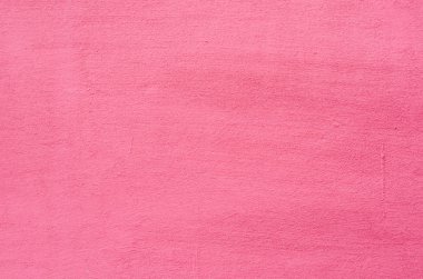 Pembe bir sıva arka plan kaplamalı ve boyalı dış, kaba dökme çimento ve beton duvar doku, dekoratif kaplama 