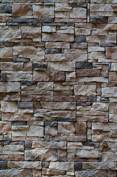 熔覆一堵石墙，天然石料的背景纹理 — 图库照片