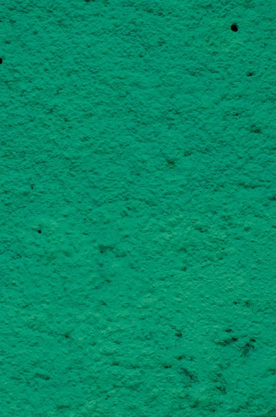 Hintergrund eines grünen Stucks beschichtet und bemalt außen, — Stockfoto