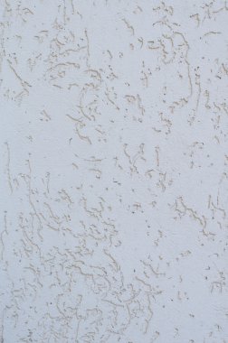 Arka plan beyaz sıva ile kaplanmış ve dış boyalı,