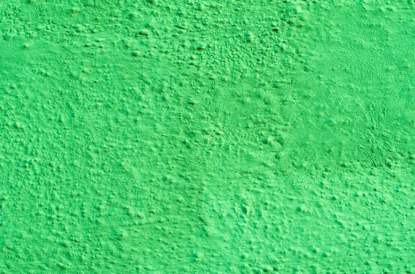 Fondo de un estuco verde lima recubierto y pintado exterior, fundición en bruto de cemento y hormigón textura de la pared, revestimiento decorativo — Foto de Stock