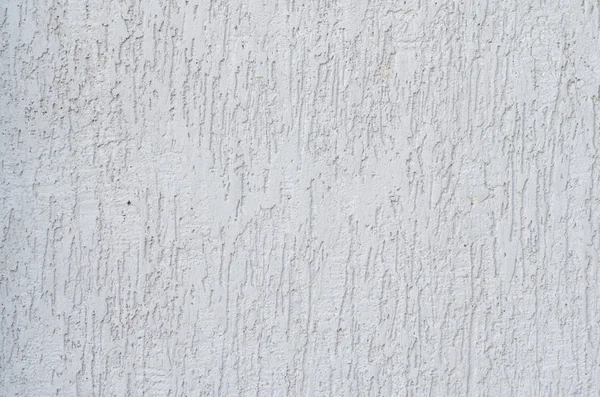 Háttér fehér stukkó bevont és festett külső, durva öntött cement és a beton fal textúra, dekoratív rusztikus bevonat — Stock Fotó