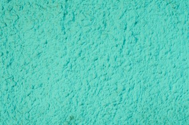 Arka plan bir turkuaz mavi sıva ile kaplı ve dış boyalı, 