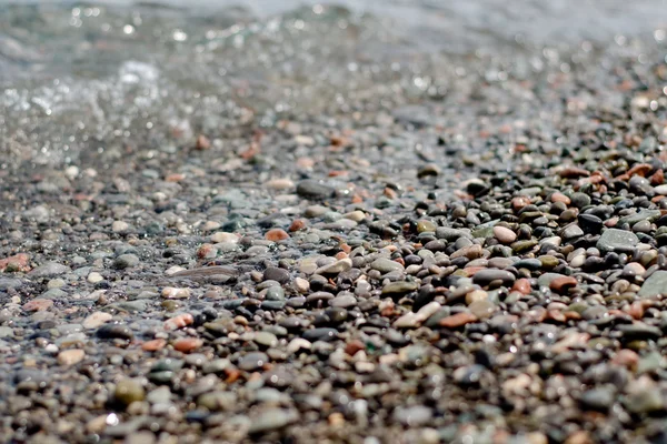 Морская текстура прозрачной воды — стоковое фото