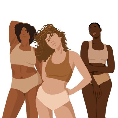 Beyaz arka planda çıplak iç çamaşırlı üç güzel kadın.