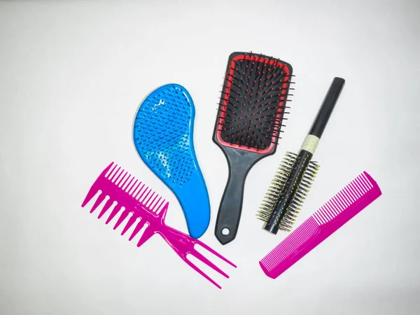 Set of various and colorful brushes and combs for hair styling