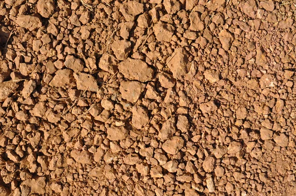 A köves talaj. Barna háttér — Stock Fotó