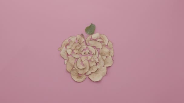 Apple beautiful composition baked ripe and slice on a pink red background — Stock Video