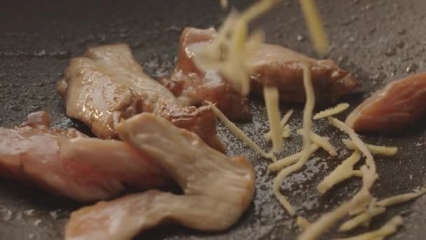 Chef prepares a delicious chicken meat Cooking of chicken breast with ginger — Stock Video
