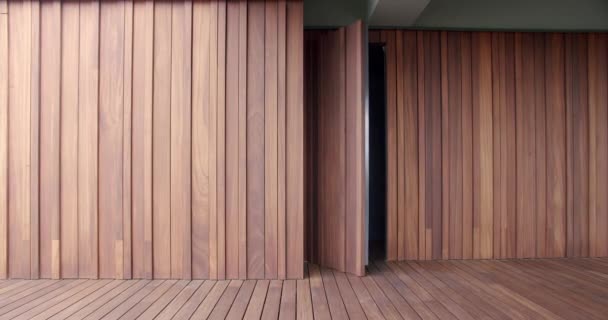 Mur en bois de couleur marron, de différentes tailles, une porte de couleur marron mur ferme — Video