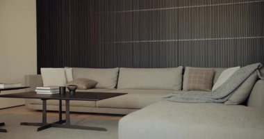 Tarafsız bir bölüm koltuğu, sade kahve masası ve zarif çizgili bir duvarı olan çağdaş oturma odası. Konfor ve tarzın mükemmel bir karışımı. Konforlu kanepe ile Modern Oturma Odası