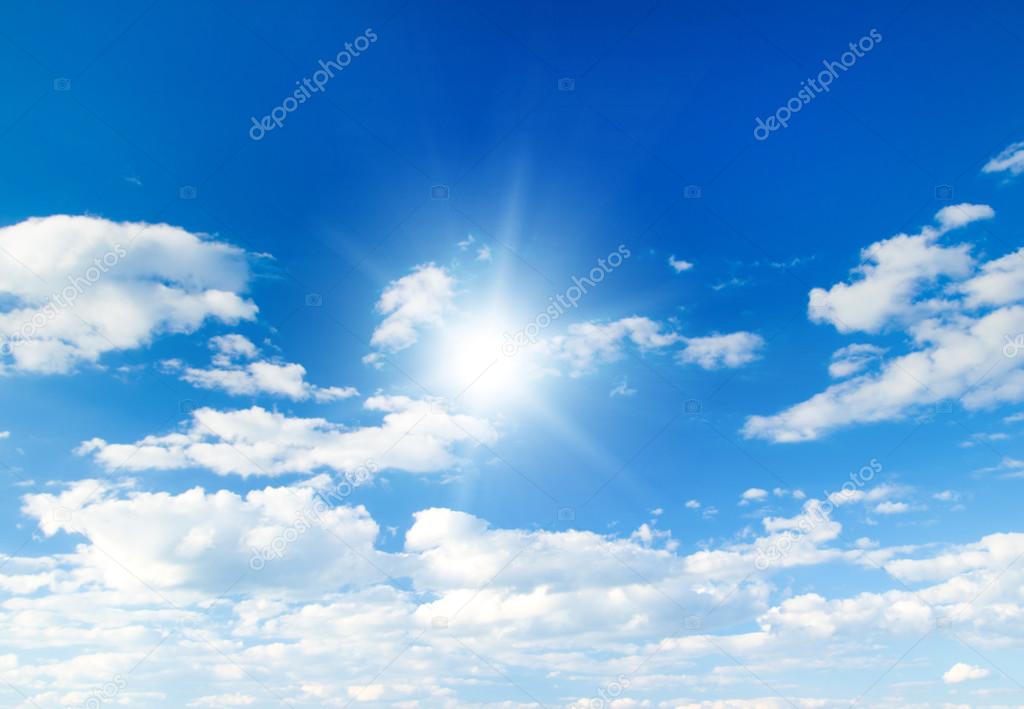 Blue sky with clouds and sun.