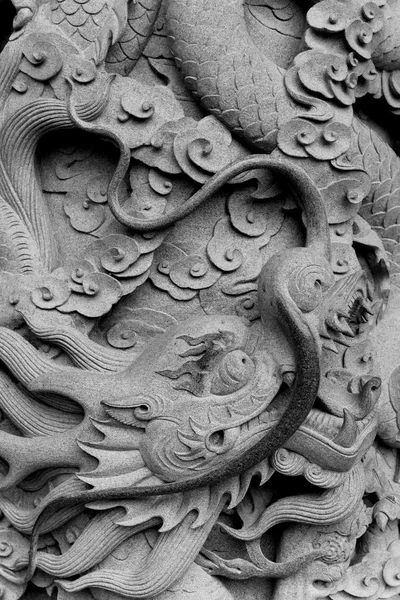 Dragon low bas scultura sul muro Immagine Stock