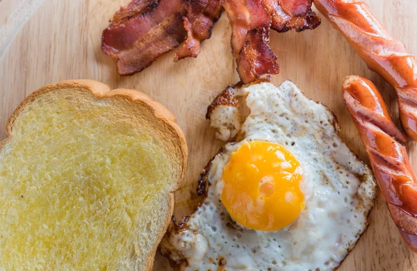 American breakfast on wood dish