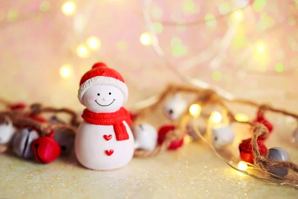 Nice Smiling Snowman New Year Background Lights Bells Игрушечные Фигурки — стоковое фото