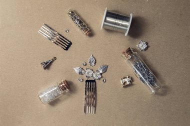 Create handmade jewelry. Accessories for jewelry, hair combs, beads, metal elements, wire, crystals, pendants