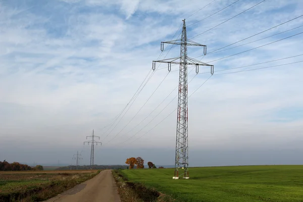 Masts power against the blue sky — Stock Photo, Image