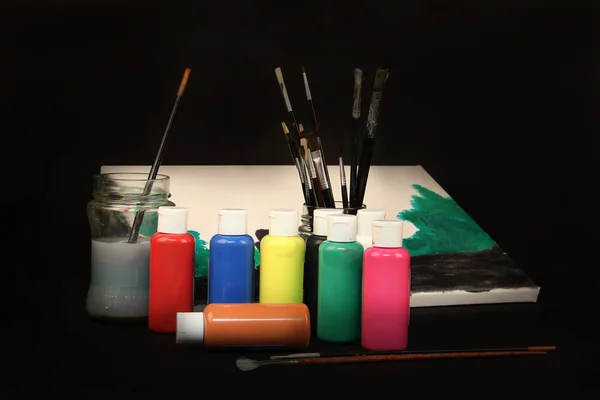 Paints, brushes, canvas ... — Stock Photo, Image