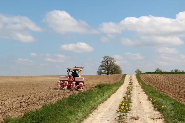 The farmer on a tractor — Stock Photo, Image