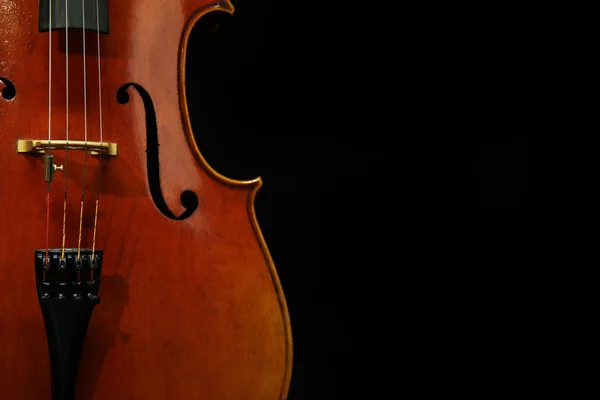 Cello auf schwarzem Hintergrund — Stockfoto