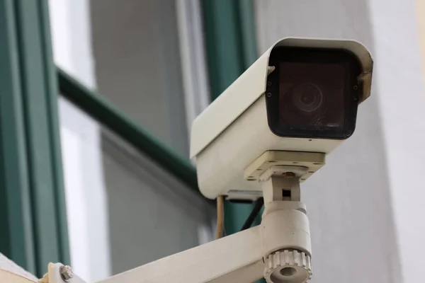 Video camera system on the wall of the building.