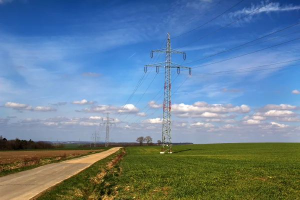 Transmission line on background of blue sky. — Stock Photo, Image