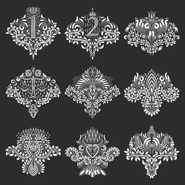 Conjunto de elementos ornamentales de diseño en forma de escudos de armas — Archivo Imágenes Vectoriales