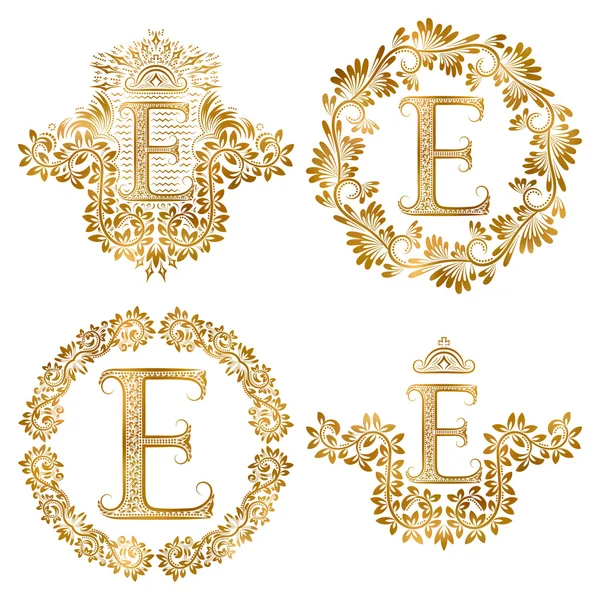 Golden letter E vintage monograms set. Heraldic monogram in coats of arms and round frames. — Stock Vector