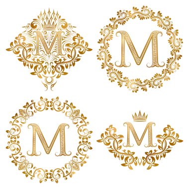 Golden letter M vintage monograms set.