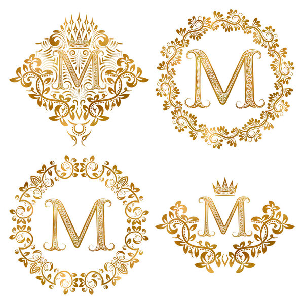 Golden letter M vintage monograms set.