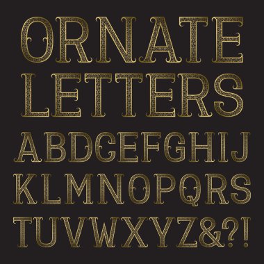 Dalları ile altın süslü harfler.