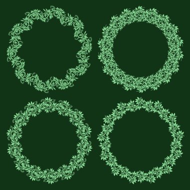 Çiçeksel vintage tarzında dizayn edilmiş yuvarlak çerçeveler. Koyu yeşil arkaplanda açık yeşil süsler.