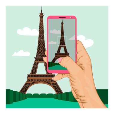Eiffel Kulesi 'nin fotoğrafını çeken akıllı bir telefon.