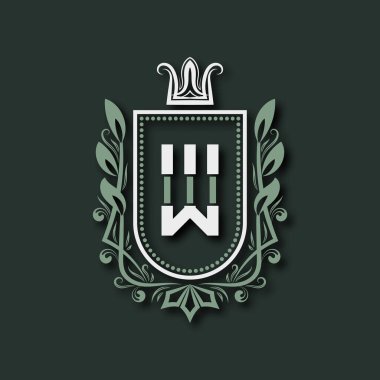 W. Heraldic harfinin birinci sınıf monogramı çiçek süsü ve tacı ile çevrili bir kalkan şeklinde..