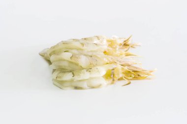 Freshness of peeled shrimp uncooked, isolated on a white macro background