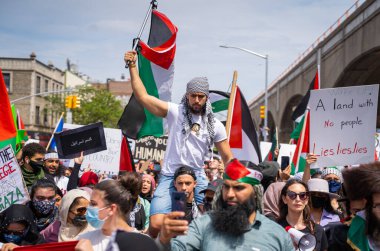 Filistin 'in Queens' teki (Sunnyside) yürüyüşü, Filistinliler ve İsrailliler arasında Gazze 'de devam eden olaylar ve ateşkes ışığında gerçekleşti. Fotoğraf 05 / 22 / 2021