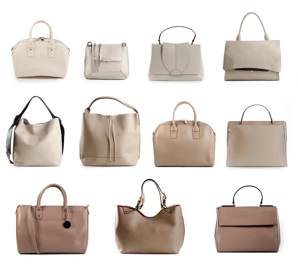 Grupo de bolsos de cuero beige de las mujeres aislados sobre fondo blanco — Foto de Stock