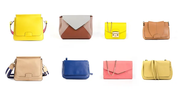 Group of color leather women handbags and purses isolated on white background — Stock Photo, Image