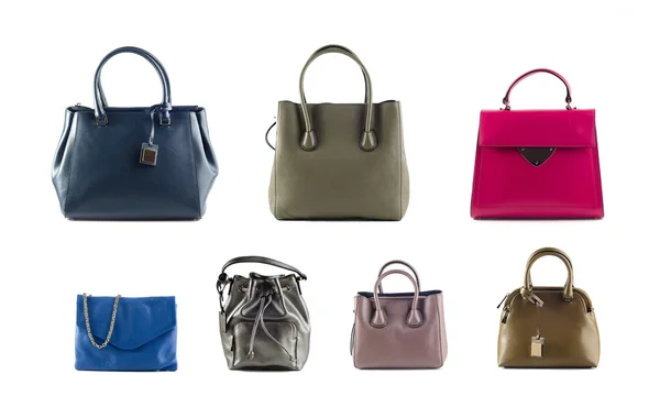 Grupp av handväskor av läder färg isolerad på vit bakgrund — Stockfoto