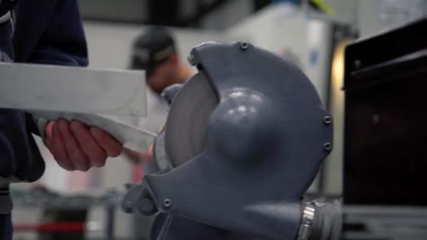 A Close up shot of man using disc sander — Vídeo de Stock