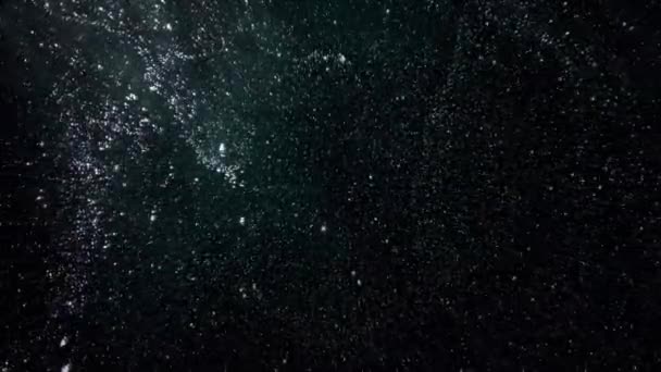 宇宙空間を移動する明るい白い斑点 — ストック動画