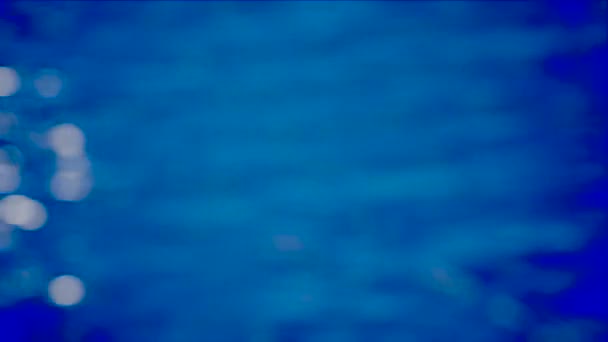 Animado fuera de foco azul océano agua que fluye — Vídeos de Stock